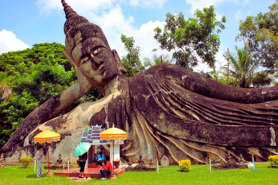 Giant reclining Buddha statue at Buddha Park Vientiane Laos – Auasia Travel